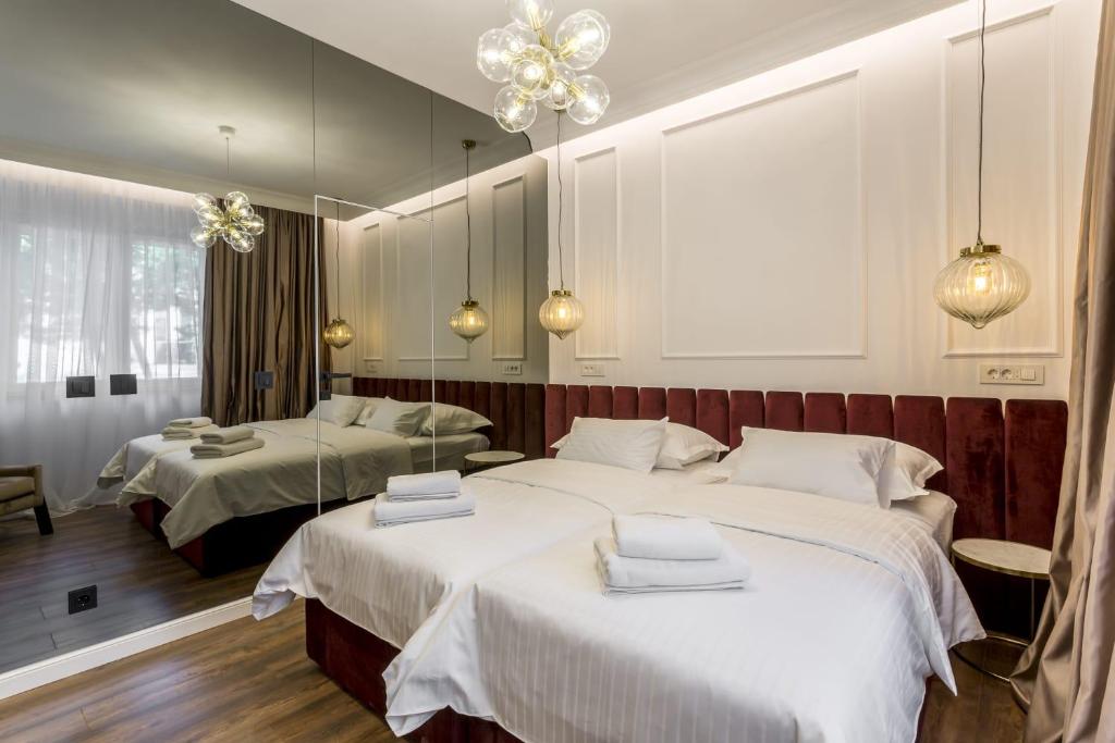 Nephelae Boutique Roomsにあるベッド