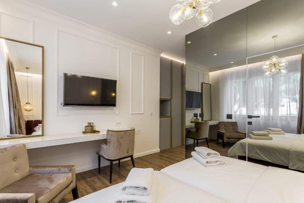 Nephelae Boutique Roomsにあるベッド