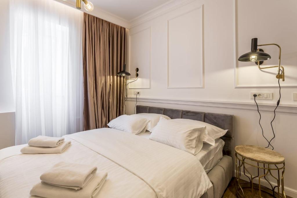 Nephelae Boutique Roomsにあるベッド
