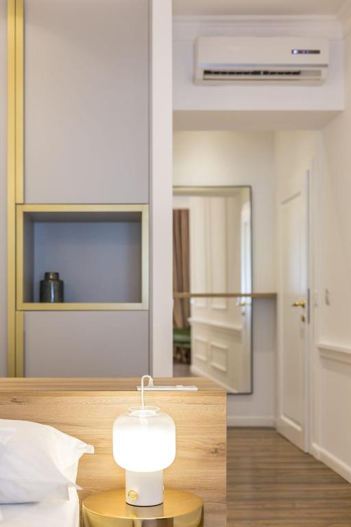 Nephelae Boutique Roomsにあるベッド