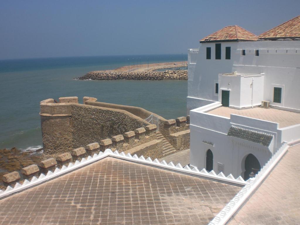 a view from the roof of a building next to the water at The Jewel of the Northern Moroccan Atlantic in Asilah in Asilah