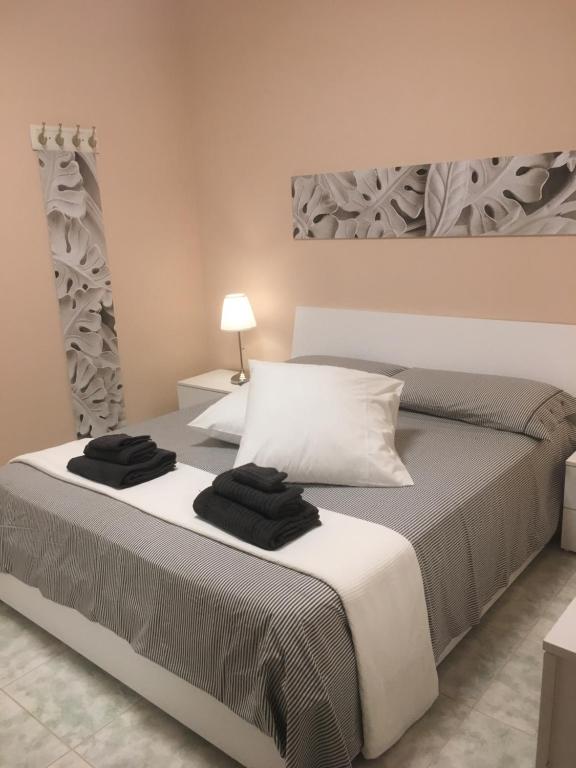 Postel nebo postele na pokoji v ubytování Casa Di Lo