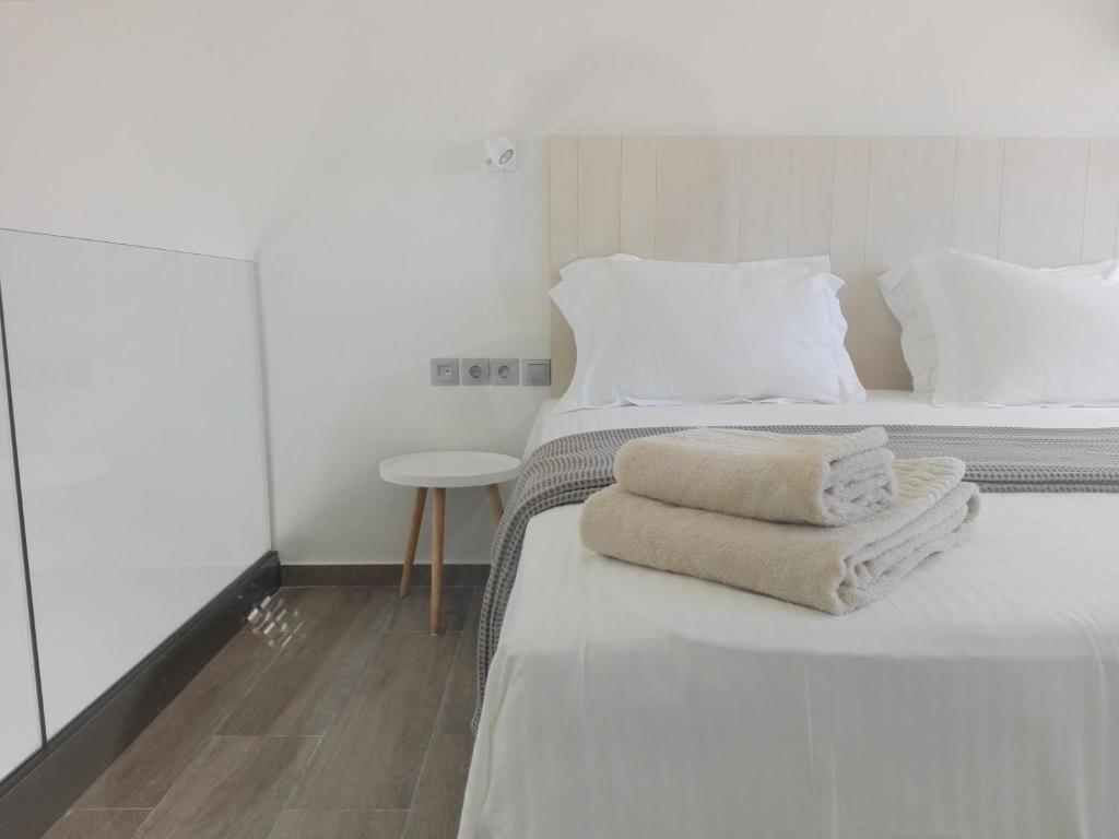 Postel nebo postele na pokoji v ubytování Lidea Boutique Hotel
