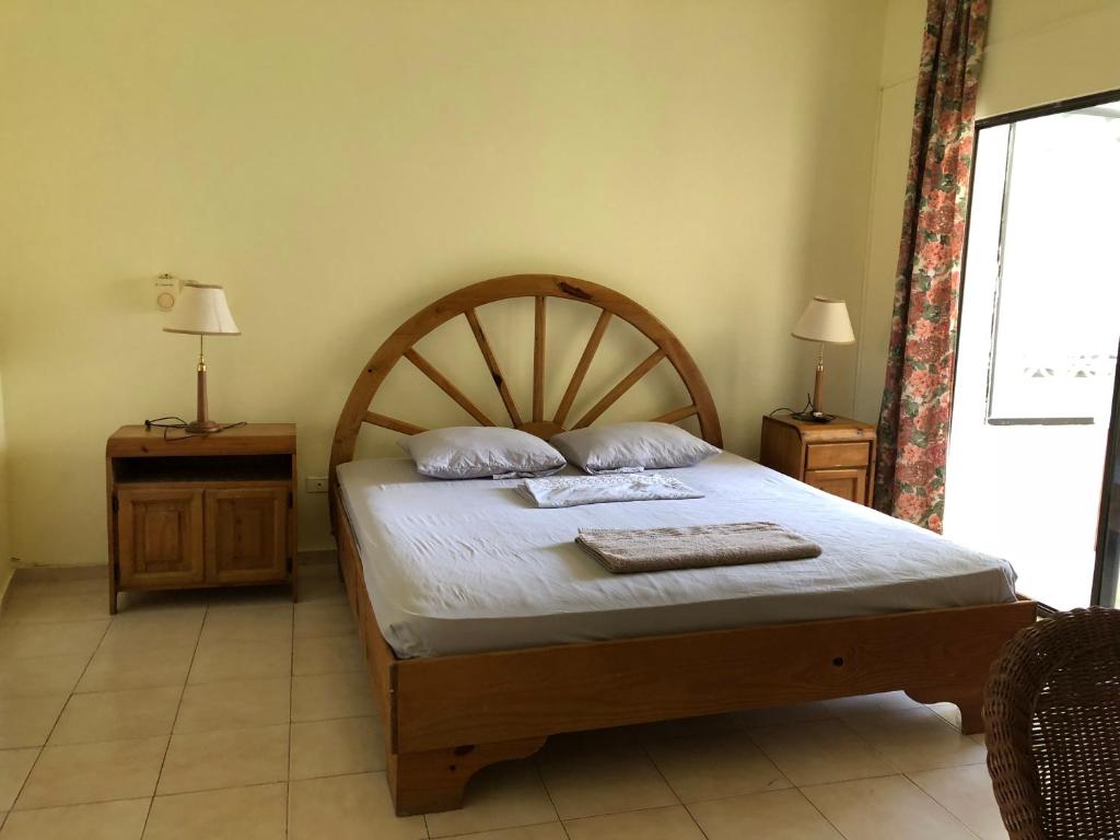 Ένα ή περισσότερα κρεβάτια σε δωμάτιο στο Hotel Condo Plaza Europa