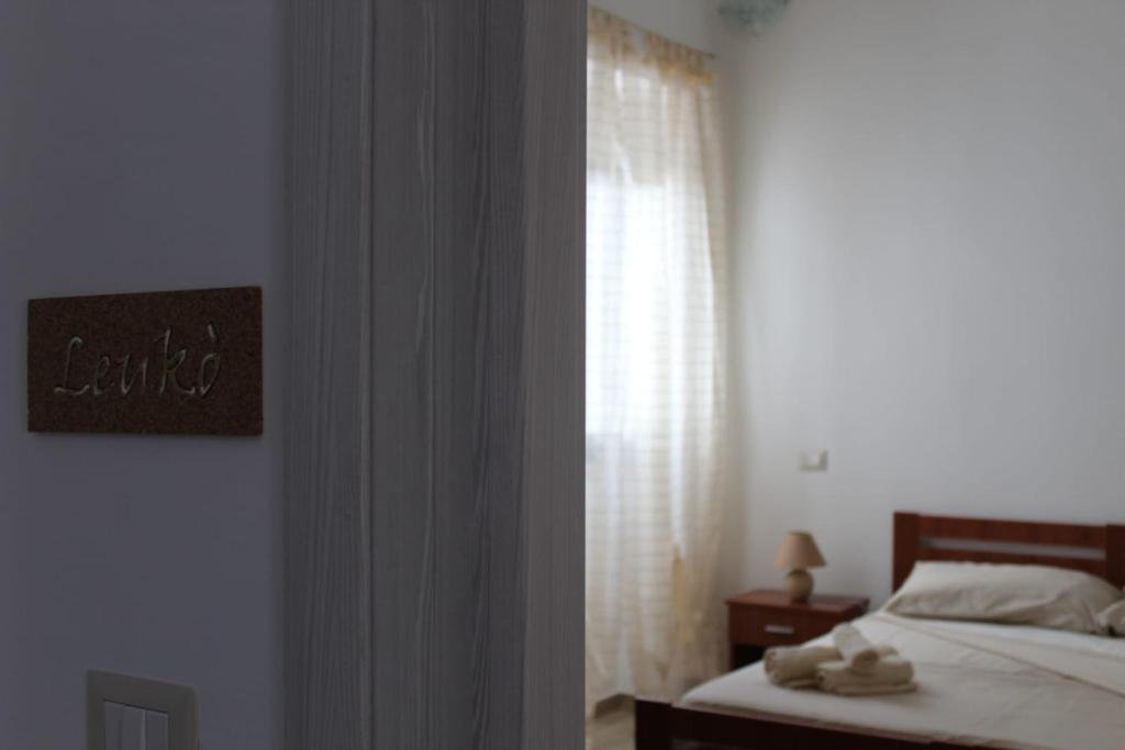 Postel nebo postele na pokoji v ubytování Krasì B&B