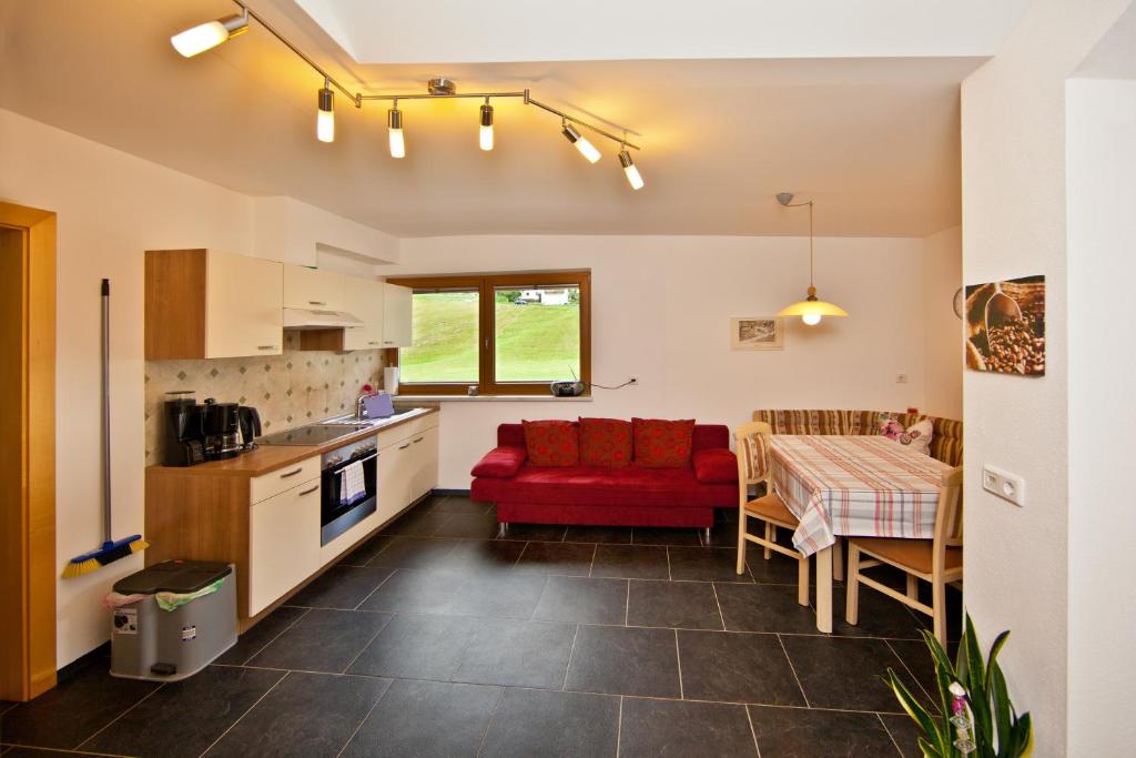 Kuchyň nebo kuchyňský kout v ubytování Apartment Oberbichl