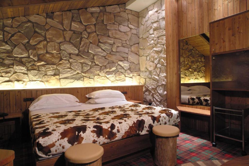 Postel nebo postele na pokoji v ubytování Hotel Motel K
