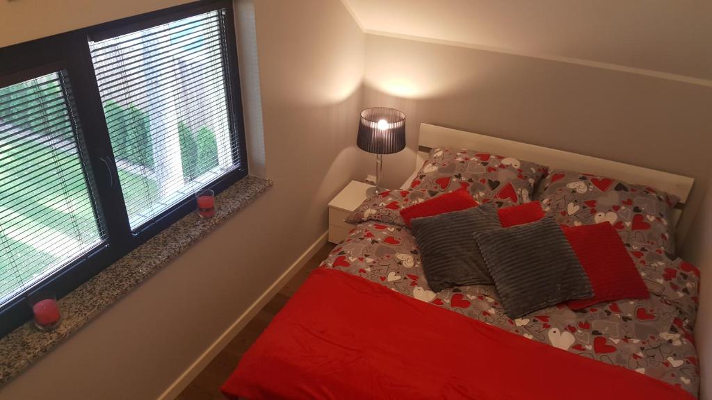 Łóżko lub łóżka w pokoju w obiekcie Hire House