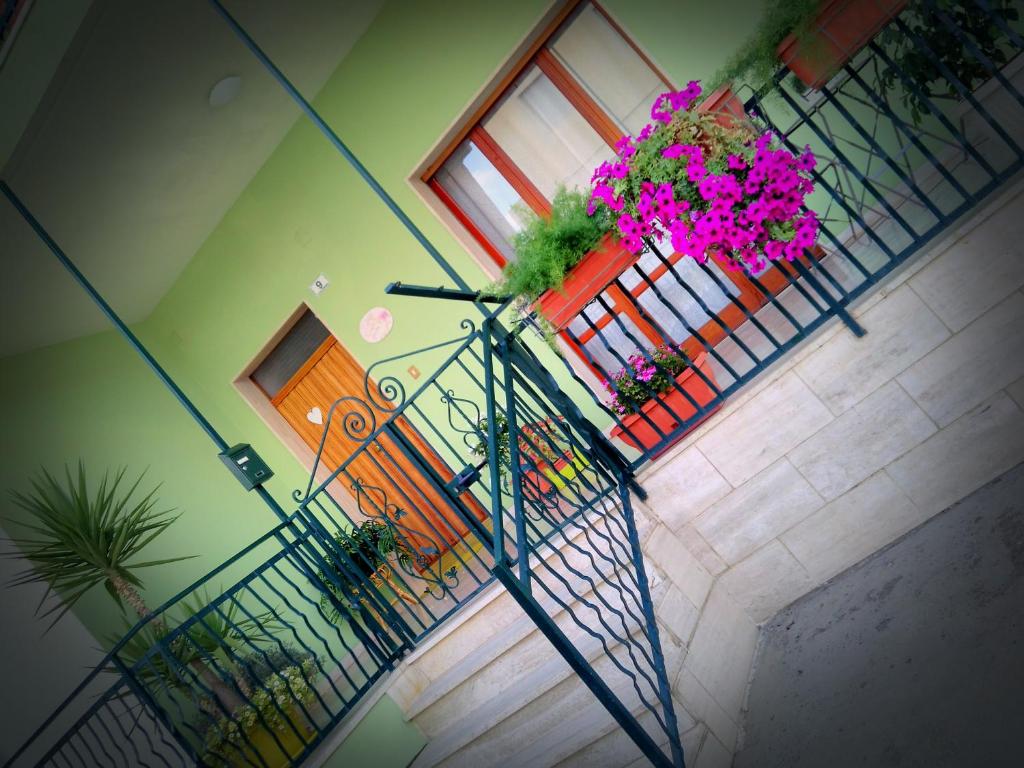 Fotografie z fotogalerie ubytování B&B L'angolo fiorito v destinaci Bernalda