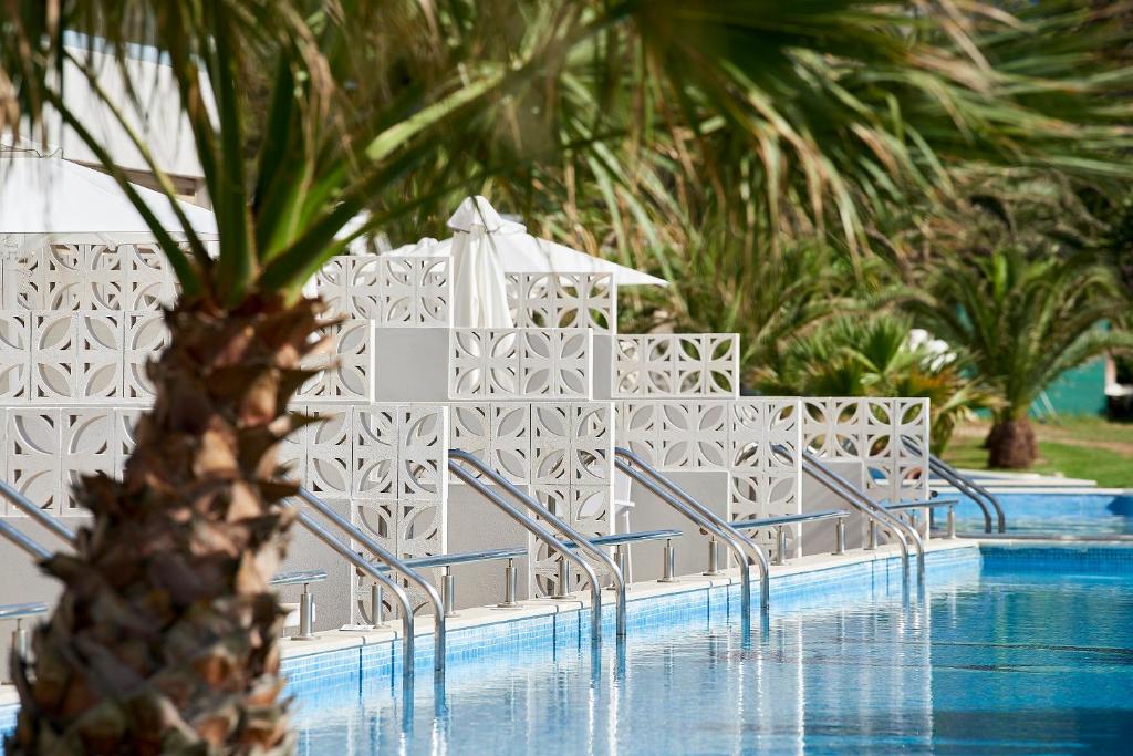 Bazén v ubytování Mythos Palace Resort & Spa nebo v jeho okolí