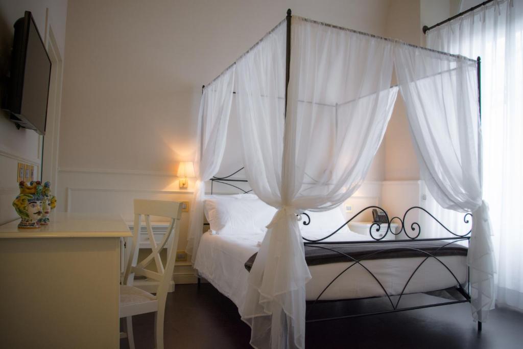 Il Duomo Relaisにあるベッド
