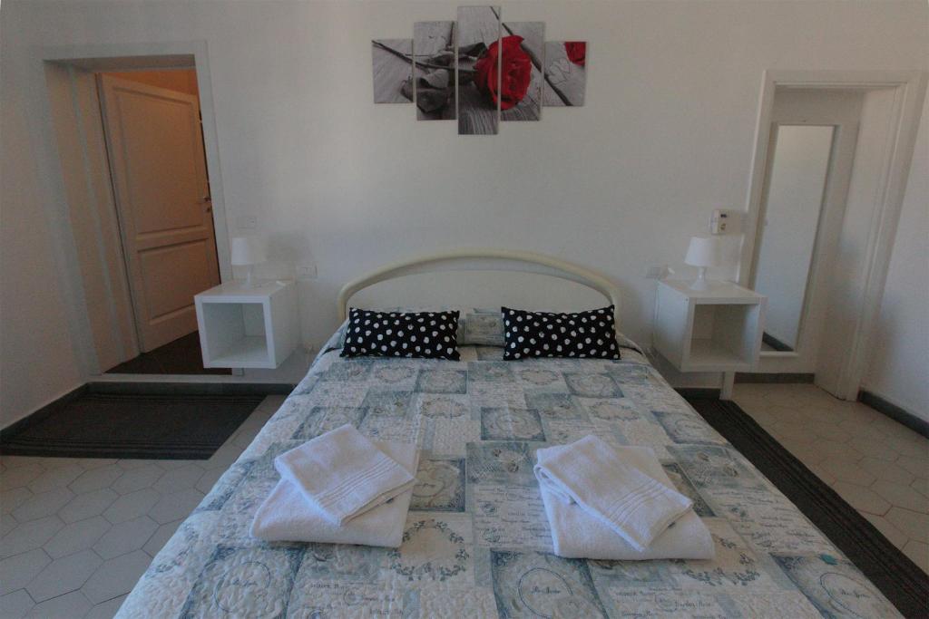 Postel nebo postele na pokoji v ubytování Magnolia Comfort & Rooms