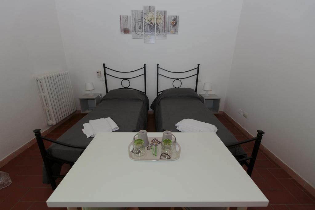 Postel nebo postele na pokoji v ubytování Magnolia Comfort & Rooms