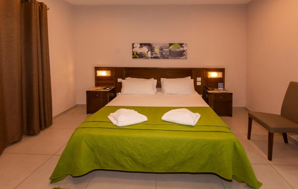 Letto o letti in una camera di Cerviola Hotel