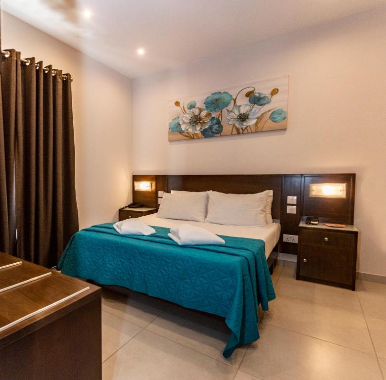 Letto o letti in una camera di Cerviola Hotel