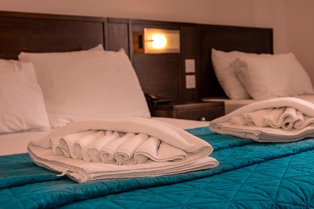 Letto o letti in una camera di Cerviola Hotel