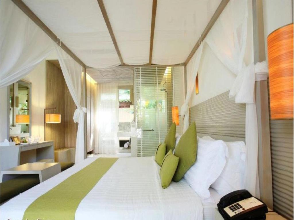 Кровать или кровати в номере Mercure Koh Chang Hideaway