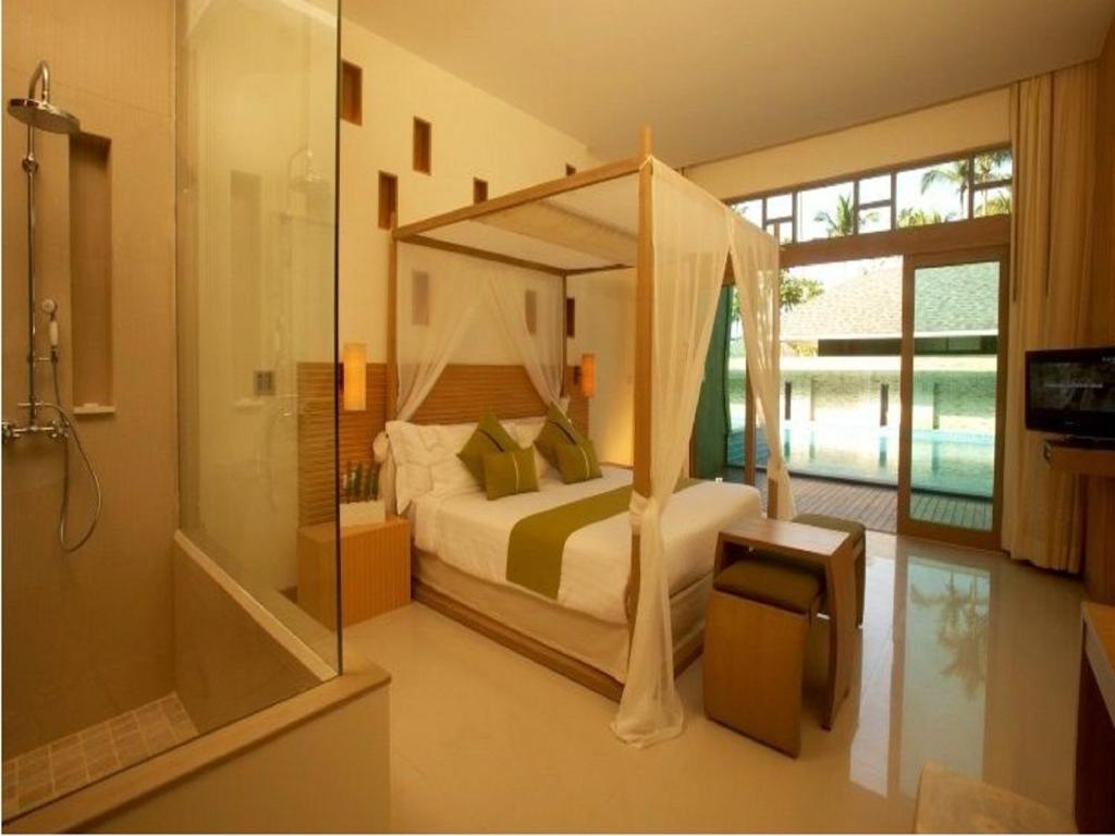 Кровать или кровати в номере Mercure Koh Chang Hideaway