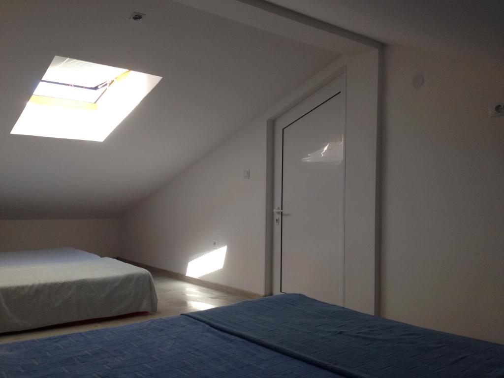 Postel nebo postele na pokoji v ubytování Apartment SM