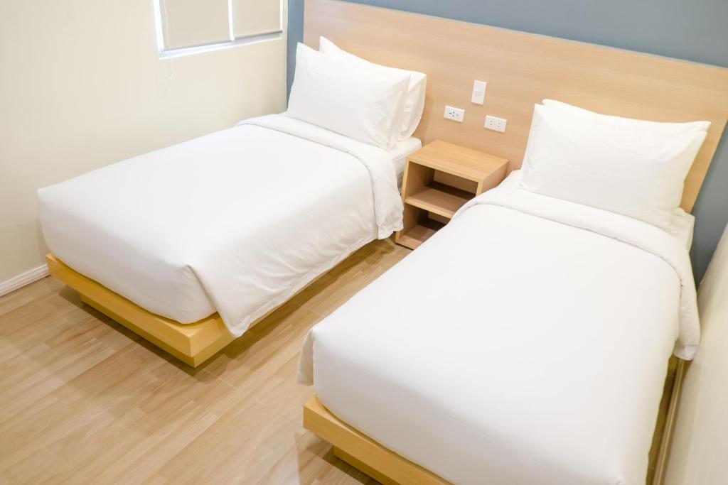 Postel nebo postele na pokoji v ubytování Bridge Hotel