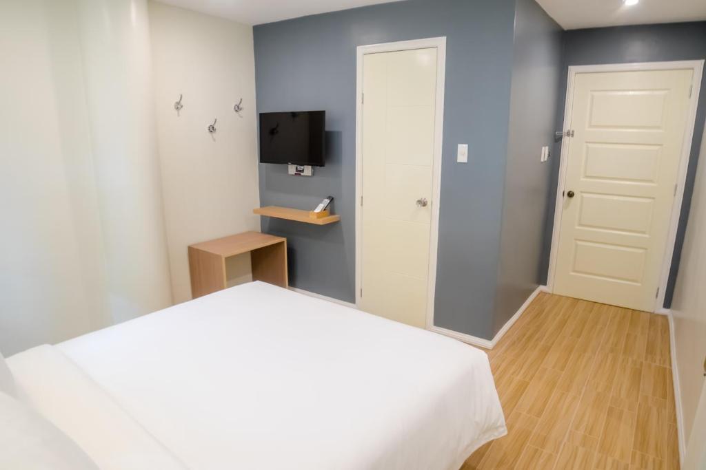 TV a/nebo společenská místnost v ubytování Bridge Hotel
