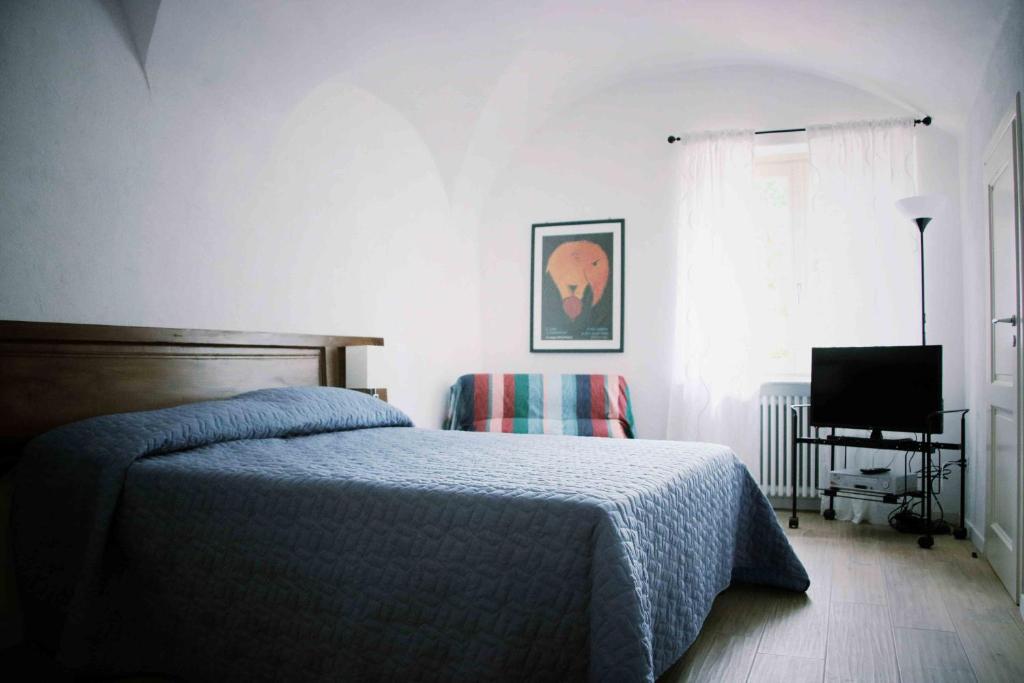 Posteľ alebo postele v izbe v ubytovaní la casa in collina