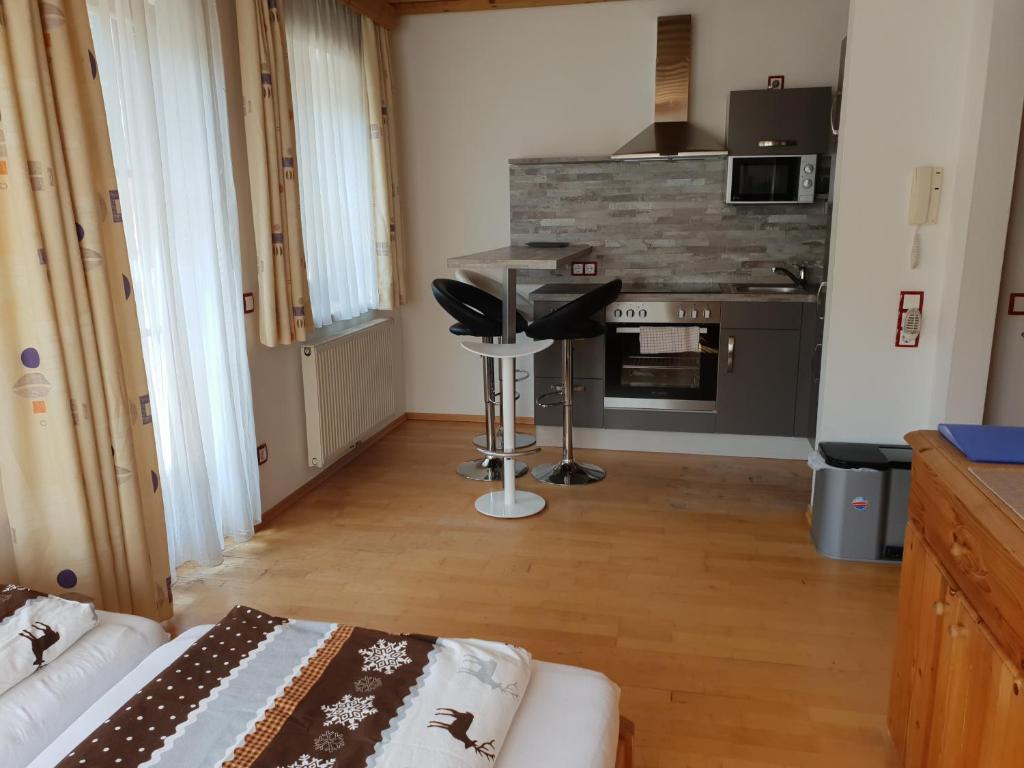 Postel nebo postele na pokoji v ubytování Appartement Gugganig