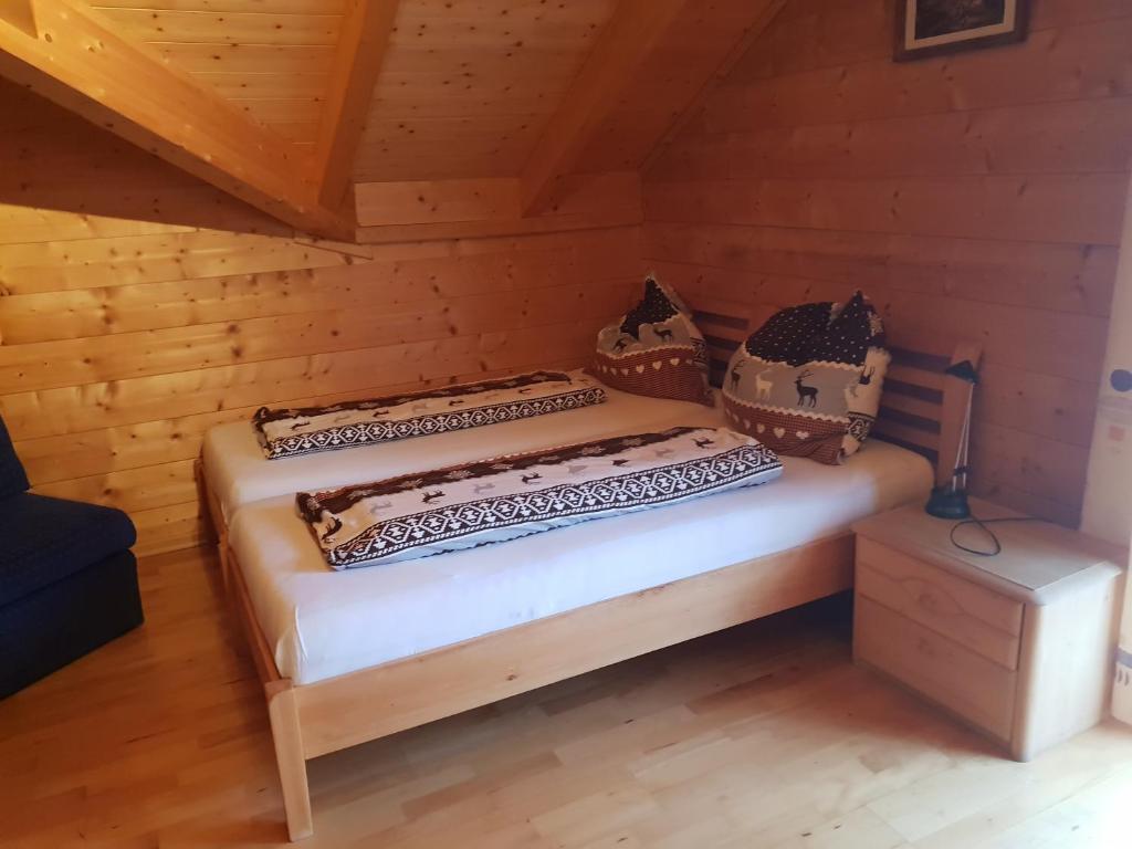Postel nebo postele na pokoji v ubytování Appartement Gugganig