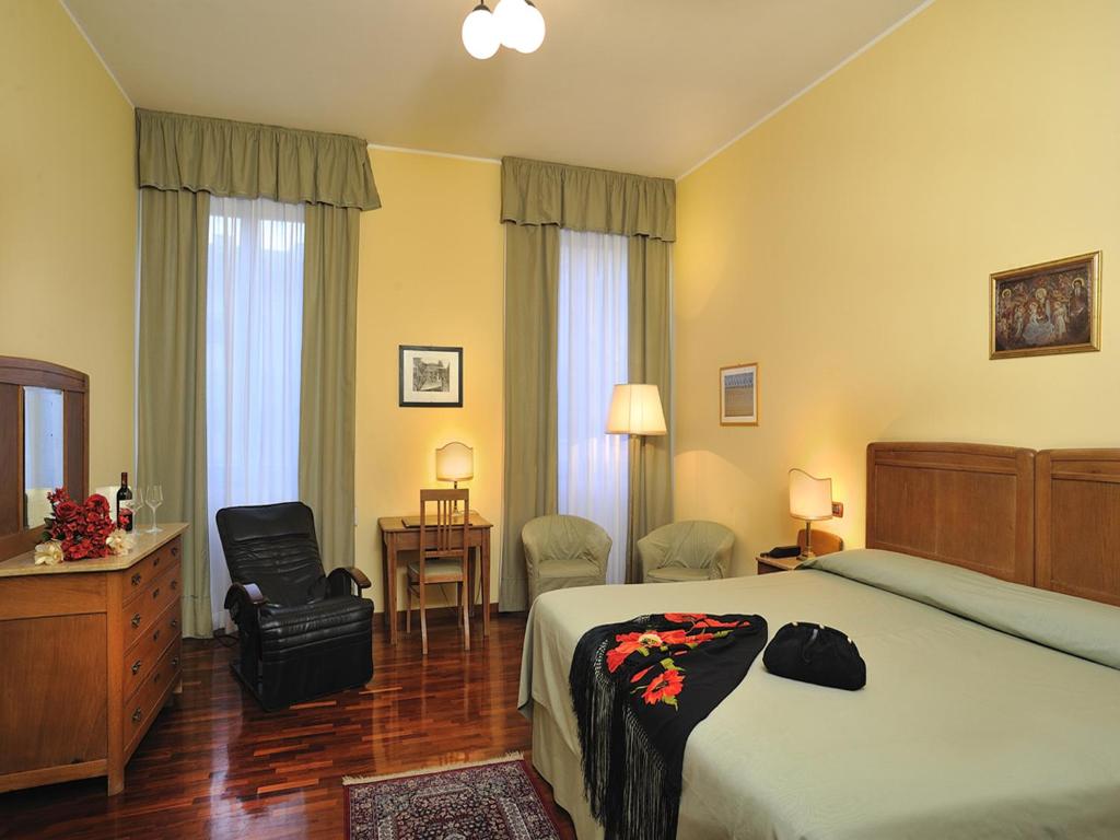 Postel nebo postele na pokoji v ubytování Albergo San Domenico