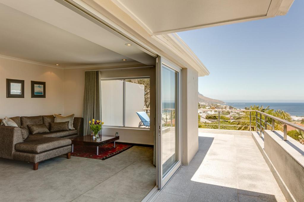 a living room with a view of the ocean at 42 On Strathmore in Cape Town