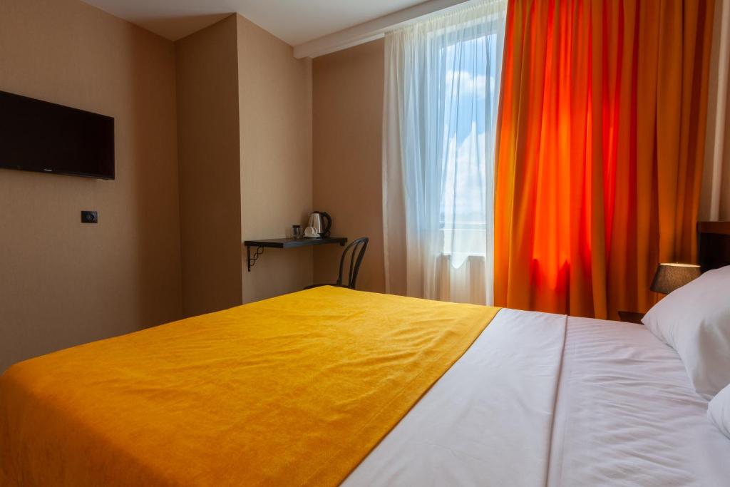 Postel nebo postele na pokoji v ubytování Solomon