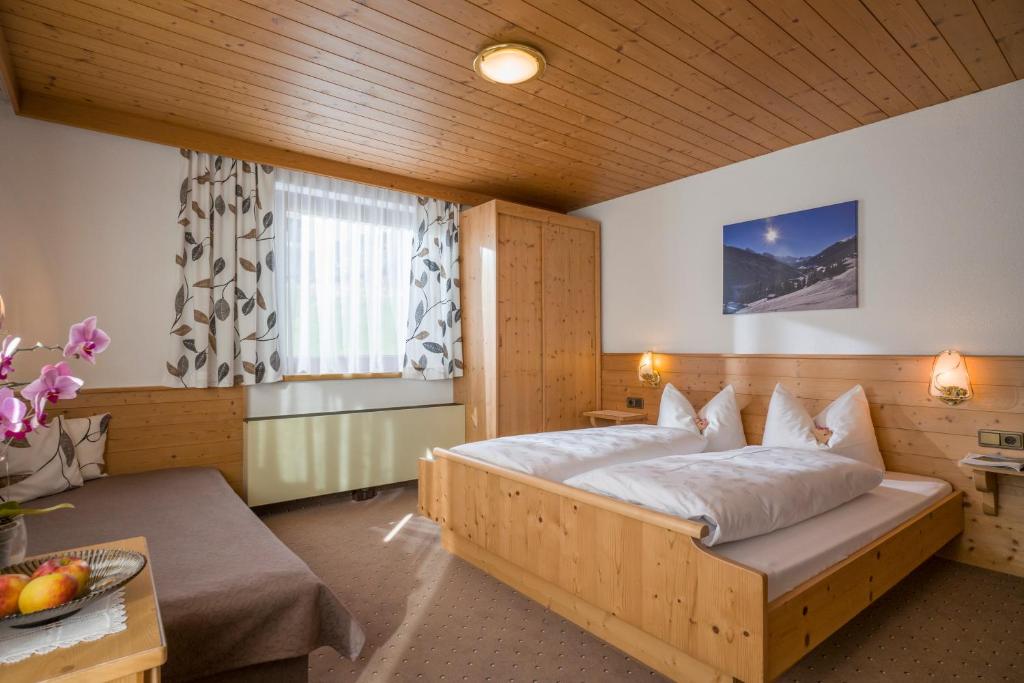 Postel nebo postele na pokoji v ubytování Grübelspitz