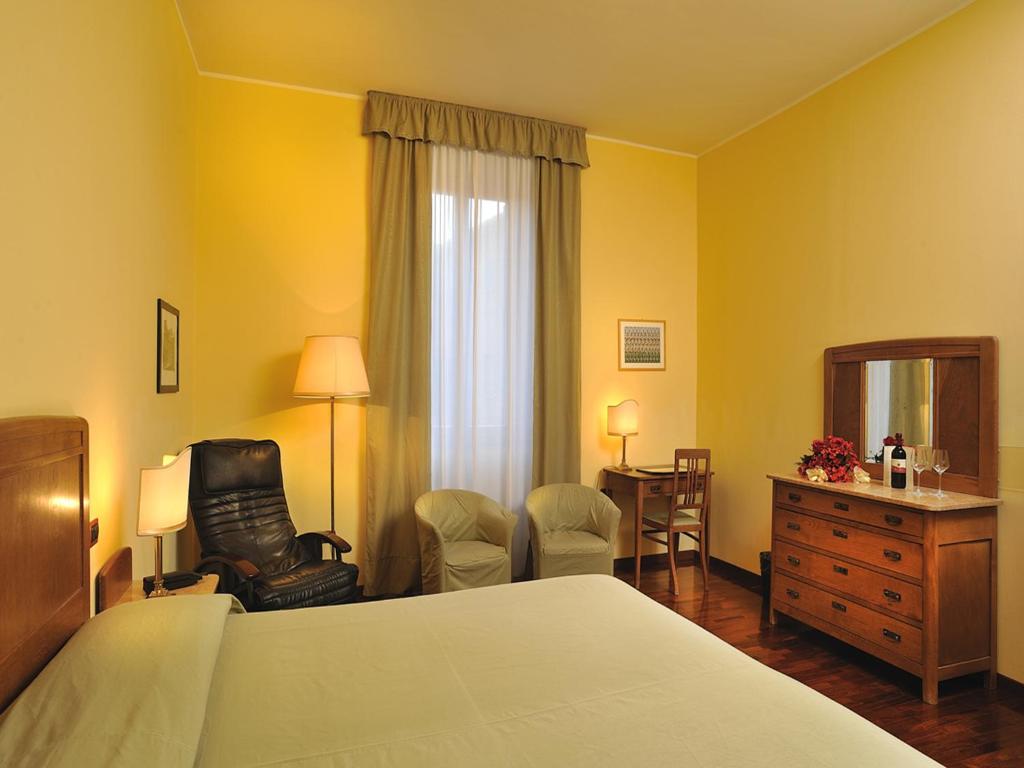 Postel nebo postele na pokoji v ubytování Albergo San Domenico