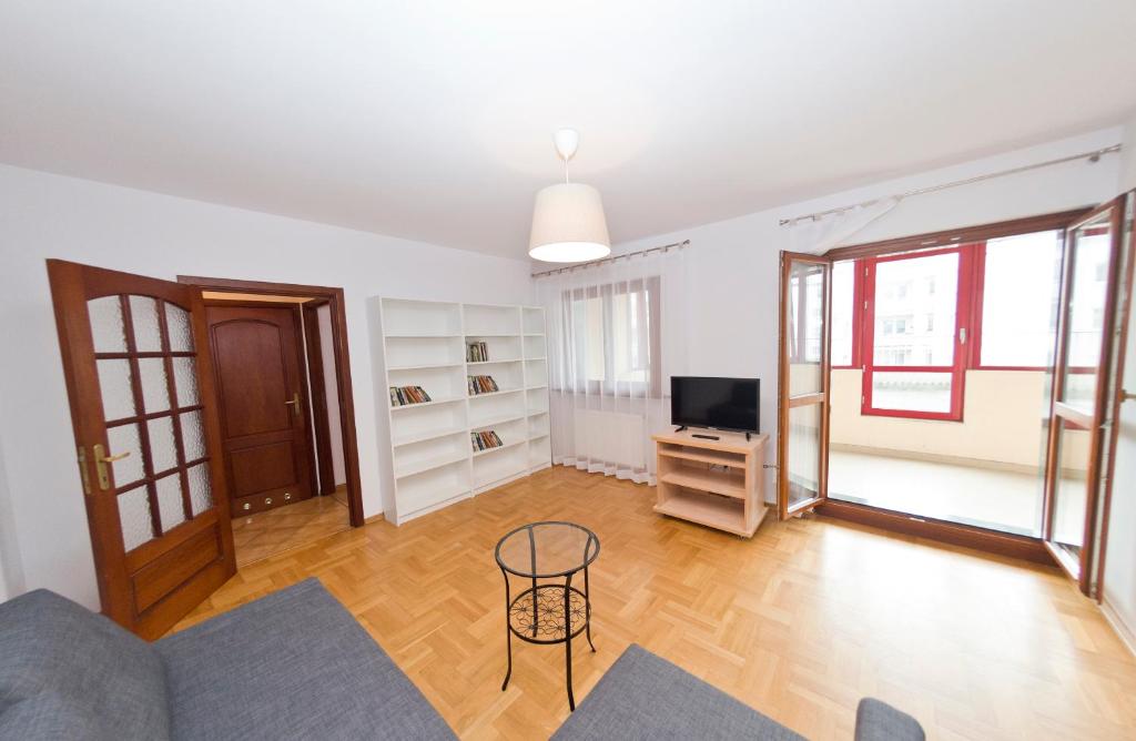 Televízia a/alebo spoločenská miestnosť v ubytovaní Villa Verona