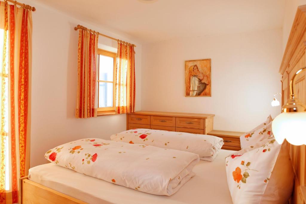 Postel nebo postele na pokoji v ubytování Apartments Pitschlmann