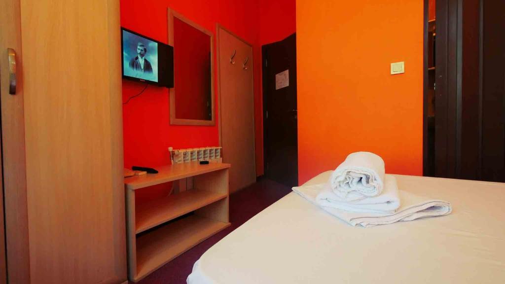 Postel nebo postele na pokoji v ubytování Hotel Alabin Central