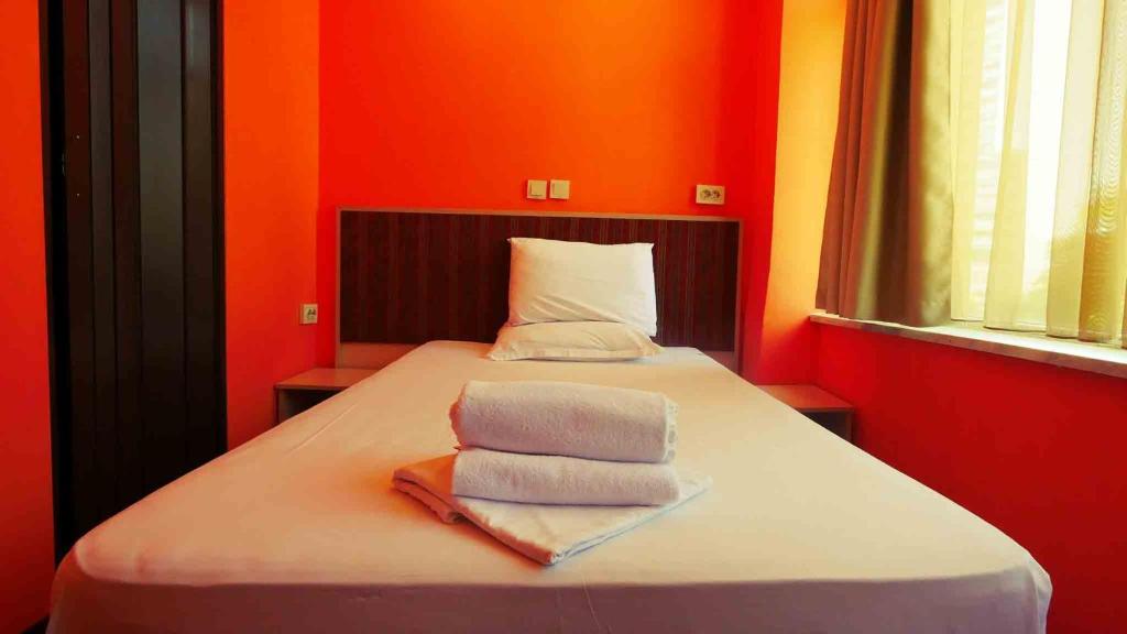 Postel nebo postele na pokoji v ubytování Hotel Alabin Central