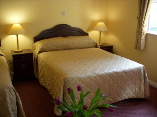 Postel nebo postele na pokoji v ubytování Dun Ri Guesthouse