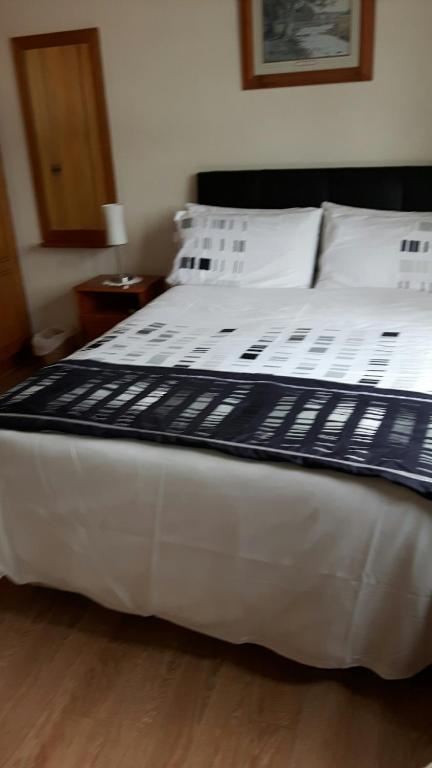 Postel nebo postele na pokoji v ubytování Scapaflow B&B