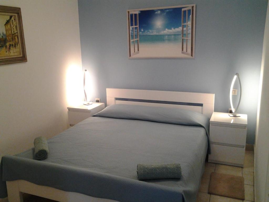 Łóżko lub łóżka w pokoju w obiekcie Apartments Villa Palme