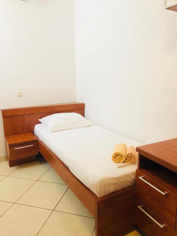 Un pat sau paturi într-o cameră la Sea view Apartment, Todorovic