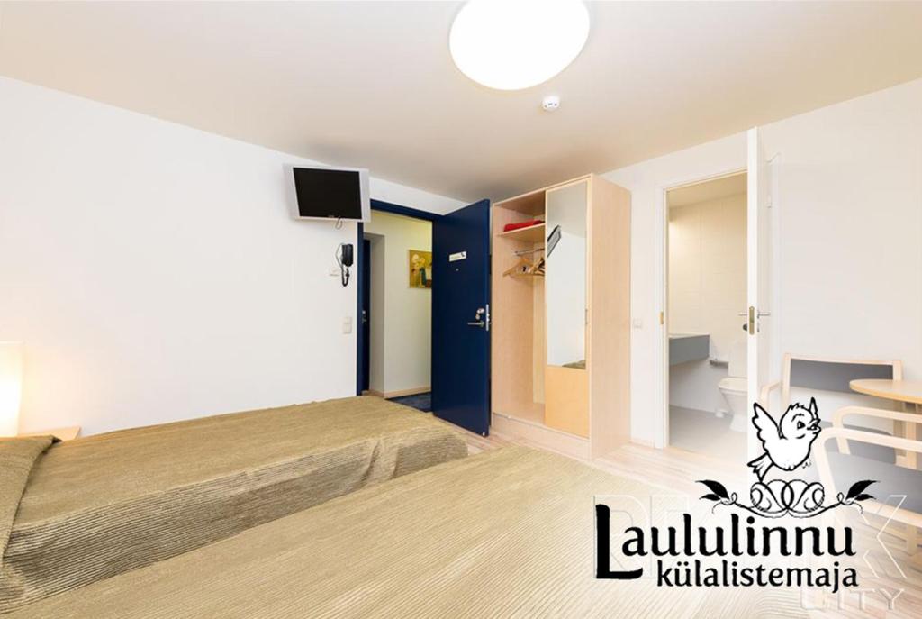 Postel nebo postele na pokoji v ubytování Laululinnu Guesthouse