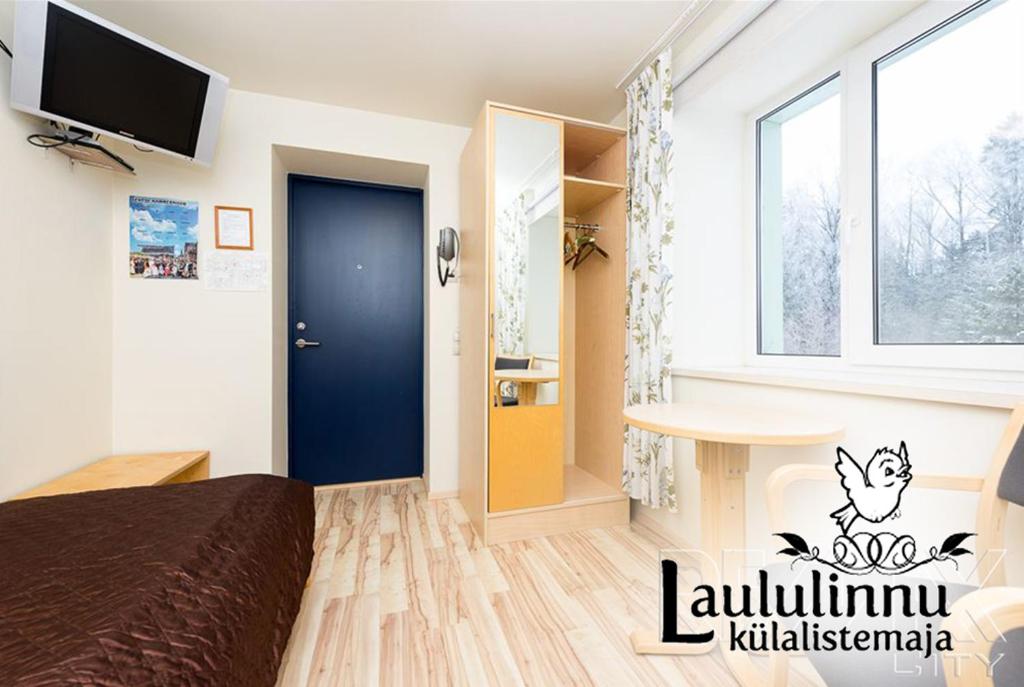 TV a/nebo společenská místnost v ubytování Laululinnu Guesthouse