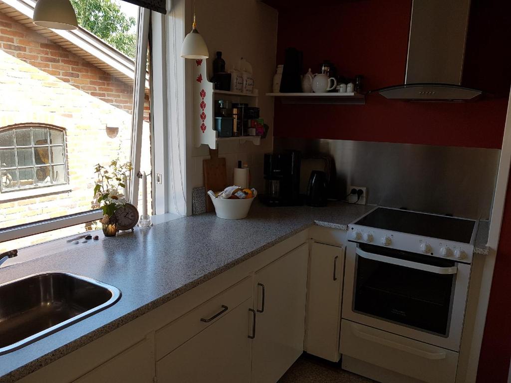 Kuchyň nebo kuchyňský kout v ubytování B&B Villa Filsø