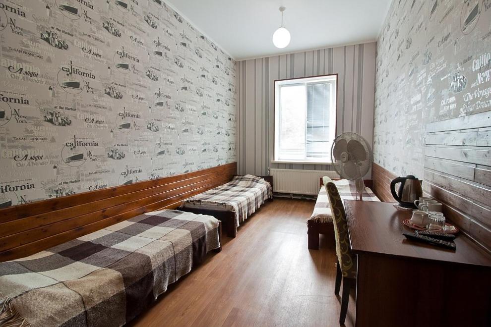 Postel nebo postele na pokoji v ubytování Tsentr Hostel