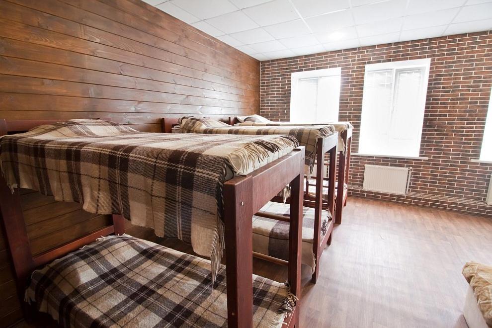 Postel nebo postele na pokoji v ubytování Tsentr Hostel