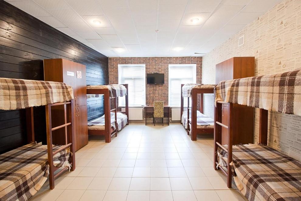 Postel nebo postele na pokoji v ubytování Tsentr Hostel