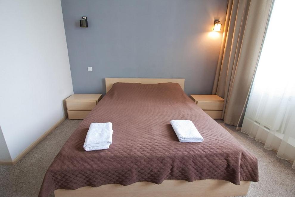 Postel nebo postele na pokoji v ubytování Tsentr Hostel