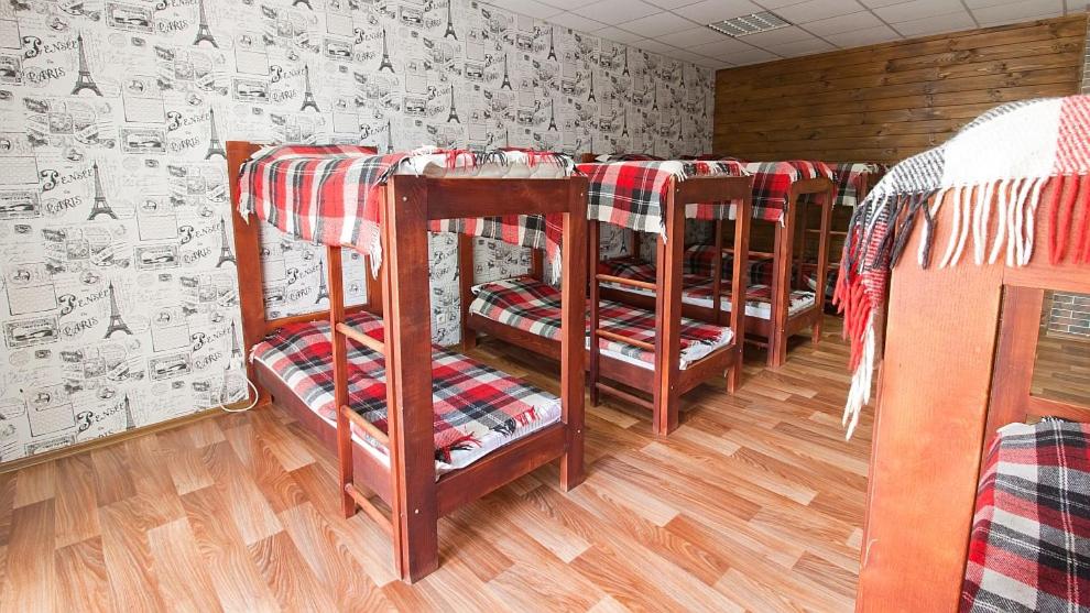 Postel nebo postele na pokoji v ubytování Tsentr Hostel