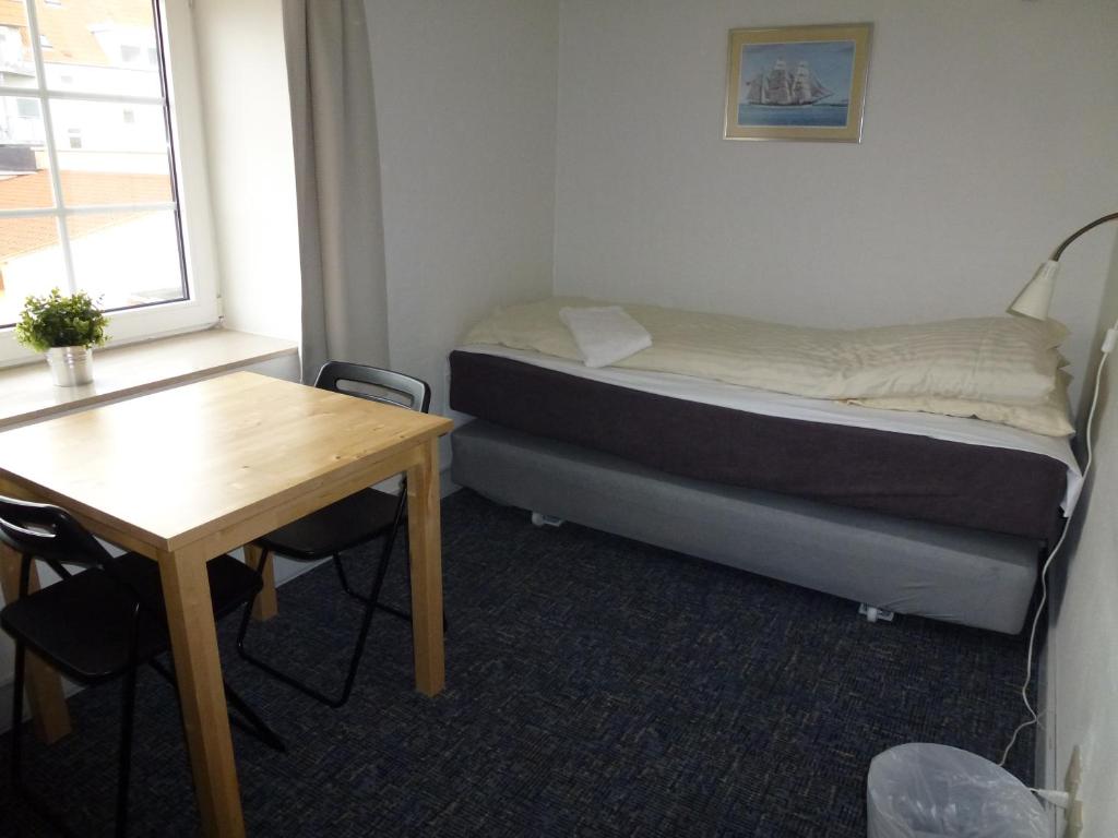 Postel nebo postele na pokoji v ubytování Danhostel Frederikshavn City